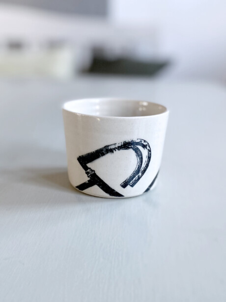 cylinder shaped natural white mug with black bike