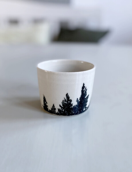 cylinder shaped natural white mug with black woods